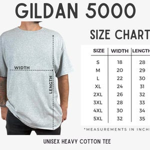 May include: A Gildan 5000 size chart for a unisex heavy cotton tee. The image displays a grey t-shirt with width and length measurement lines, alongside a table listing sizes S through 5XL with corresponding dimensions in inches.