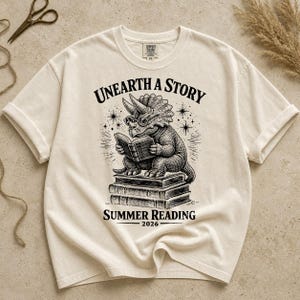 Comfort Colors Summer Reading 2026 Shirt Unearth The Story Dinosaur Book Lover Teacher Librarian Student Back to School Retro Reading Gift image 9
