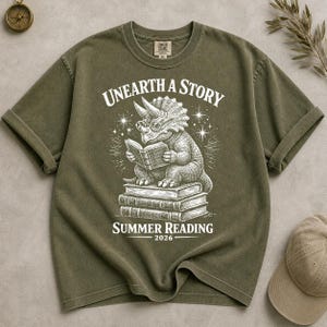 Comfort Colors Summer Reading 2026 Shirt Unearth The Story Dinosaur Book Lover Teacher Librarian Student Back to School Retro Reading Gift image 10