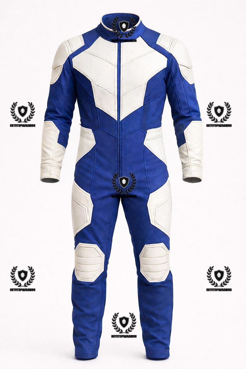 May include: A blue and white leather jumpsuit with a high collar and a full-length zipper. The suit features white panels on the chest, shoulders, and legs, with padded accents on the shoulders and knees. The suit has long sleeves and is designed for protection.