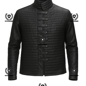 May include: Black quilted leather jacket with a high collar and button closures. The jacket features a vertical buttoned closure and long sleeves. A stylish outerwear piece.