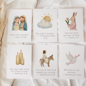 May include: Six rectangular white cards featuring watercolor illustrations and Bible verses. Images include a couple, a sun and cloud, a rabbit with a flower, three candles, a figure on a donkey, and a dove with a flower. Text includes specific scripture citations.
