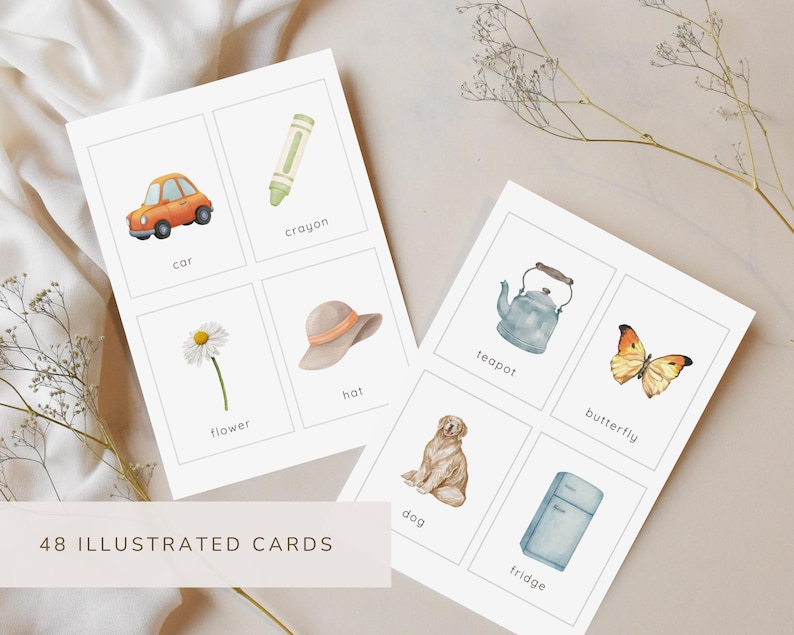 May include: Set of 48 illustrated cards featuring watercolor images of everyday objects. The cards include a car, crayon, flower, hat, teapot, butterfly, dog, and fridge. The cards are arranged on a neutral background.