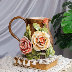 Handcrafted Ceramic Vase with Handle: Rustic Floral Home Accent