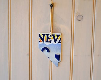 Nevada license plate ornament, Christmas ornament, measures approx2 3/4" H x 4 1/4" H overall  height with leather cord 7 1/2" FREE SHIPPING