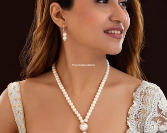 Elegancki naszyjnik z kryształową perłą i kolczykami