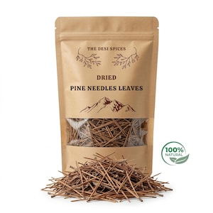 May include: A brown paper bag with a clear window containing dried pine needles. The bag has text that reads "The Desi Spices" and "Dried Pine Needles Leaves". A pile of pine needles sits in front of the bag. A green and white label reads "100% Natural".
