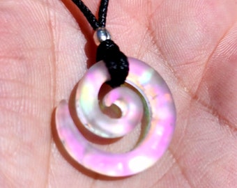 Small carved sandblasted dichroic glass spiral rainbow galaxy on pinky purp pendant