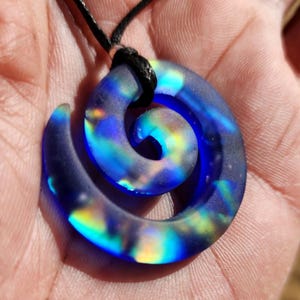Glass Spiral, hand made high vibrational intention pendant...sandblasted dichroic glass rainbow galaxy  on Blue  Med.  1..2dia