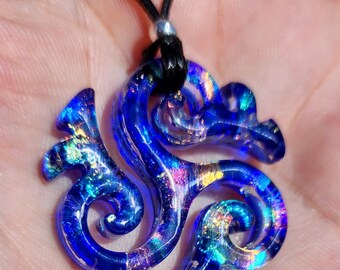 Medium carved dichroic glass Tri~ spiral rainbow on blue pendant