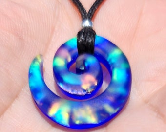 Small carved sandblasted dichroic glass spiral rainbow galaxy on blue pendant