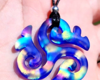 Medium carved dichroic glass sandblasted Tri~ spiral rainbow on blue pendant