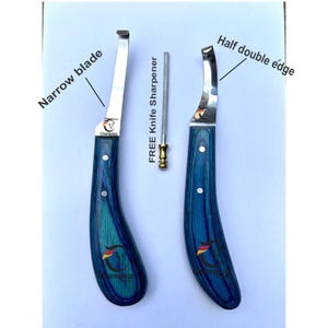 May include: Two hoof knives with blue wooden handles and stainless steel blades, one with a narrow blade and the other with a half double edge. A free knife sharpener is included. The knives have a Champion logo.