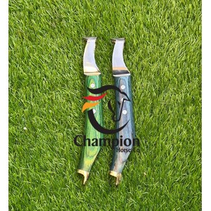 May include: Two hoof knives with curved metal blades and wooden handles, one in a bright green finish and the other in a dark teal finish. Each handle is secured with two silver rivets and features a gold-tone metal bolster at the base.
