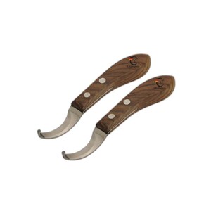 May include: Two hoof knives with curved silver metal blades and brown wood grain handles. Each handle is secured with two silver rivets and features a small logo with the text Champion printed in black near the top of the wooden grip.