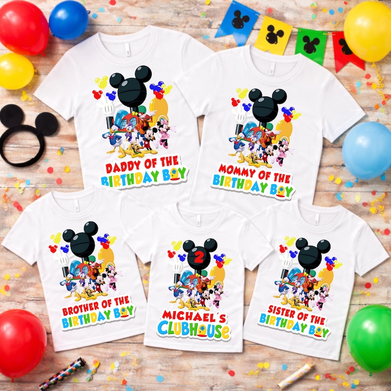 May include: Five white short-sleeve t-shirts featuring a colorful Disney character graphic with Mickey Mouse ears and balloons. The shirts display text including Daddy of the Birthday Boy, Mommy of the Birthday Boy, Brother, Sister, and Michael's Clubhouse.