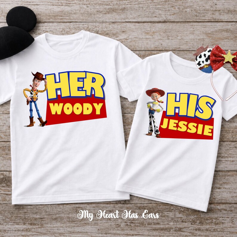 May include: Two white short-sleeve t-shirts. The left shirt features Woody with the text HER WOODY in yellow and red. The right shirt features Jessie with the text HIS JESSIE in yellow and red. Includes black mouse ears and a red sequin bow headband.