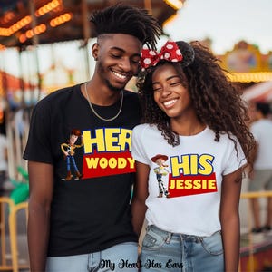 May include: A black t-shirt featuring Woody and the text HER WOODY, and a white t-shirt featuring Jessie and the text HIS JESSIE. Both shirts display the characters alongside bold yellow and red lettering inspired by the Toy Story logo design.