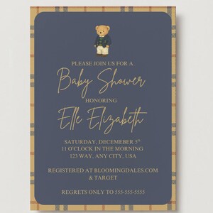 May include: Baby shower invitation with a navy blue background and a plaid border. The invitation features a teddy bear illustration and gold script text that reads "Baby Shower" and "Elle Elizabeth".