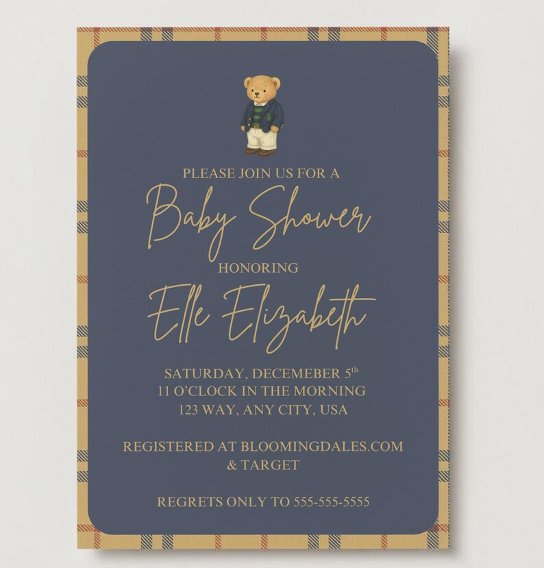 May include: Baby shower invitation with a navy blue background and a plaid border. The invitation features a teddy bear illustration and gold script text that reads "Baby Shower" and "Elle Elizabeth".