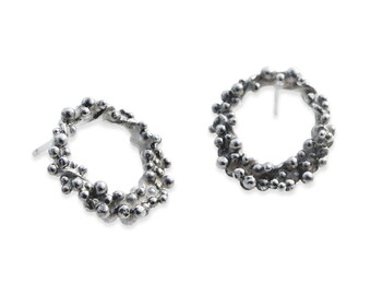 Encrusted circle studs. Sterling Silver. Signature collection.