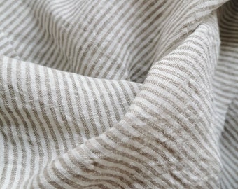 Linen soft fabric with  regular stripes in light beige and white colors