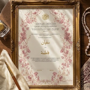 Puede incluir: Un certificado de matrimonio islámico enmarcado con bordes florales rosas, caligrafía dorada y texto impreso en inglés y árabe. El documento incluye los nombres Sufian y Fatima, con líneas de firma designadas para el novio y la novia.