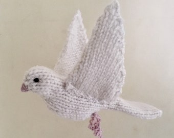 Knitted flying dove bird