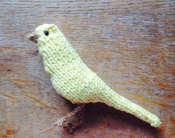 Knitted pale lemon canary bird