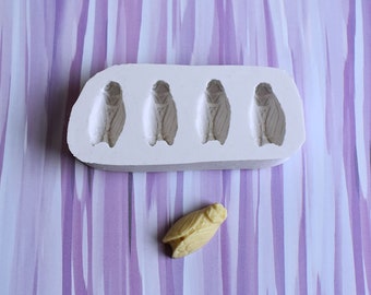 Mold of 4 cicadas 2 cm in soft white silicone of superior quality