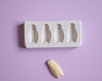 Mold of 4 cicadas 3 cm in soft white silicone of superior quality