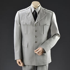 Jeeva Fashions New Stylish Partywear Formal Grey Color Suiting Fabric Designer Safari Suit For Men.