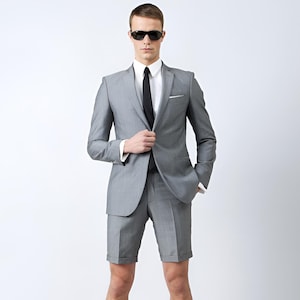 Jeeva Fashions New Stylish Partywear Formal Grey Designer Coat With Short Pant for Men.