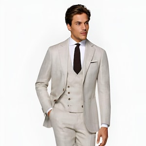 Jeeva Fashions New Stylish Partywear Formal Grey Color Designer 3 Piece Coat Pant Suit For Men.