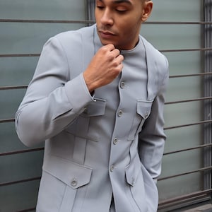 Jeeva Fashions New Stylish Partywear Formal Grey Color Suiting Fabric Designer Safari Suit For Men.