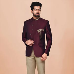 Jeeva Fashions New Stylish Partywear Formal Maroon Embroidered Bandhgala Jodhpuri Coat Pant Suit For Men.