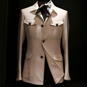 Jeeva Fashions New Stylish Partywear Formal Ivory Color Suiting Fabric Designer Safari Suit For Men.