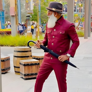 Jeeva Fashions New Stylish Partywear Formal Maroon Color Suiting Fabric Designer Safari Suit For Men.