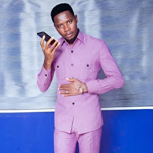 Jeeva Fashions New Stylish Partywear Formal Lavender Color Suiting Fabric Designer Safari Suit For Men.