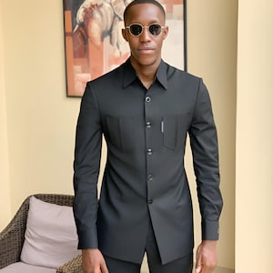 Jeeva Fashions New Stylish Partywear Formal Black Color Suiting Fabric Designer Safari Suit For Men.