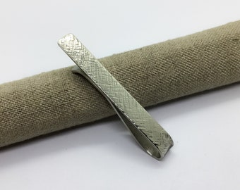 Nickel silver tie clip with cross hatch hammered texture