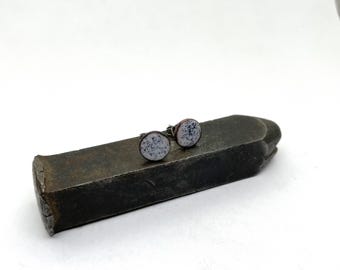 Black and white speckled circle enamel stud earrings, with stainless steel posts