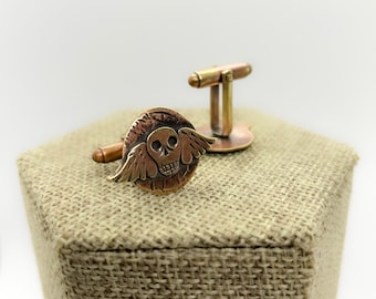 Skull cuff links