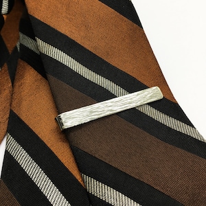 Nickel silver tie clip with hammered texture