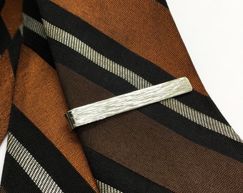 Nickel silver tie clip with hammered texture