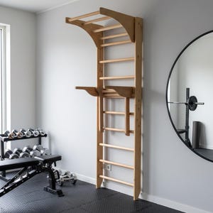 May include: A set of three ceramic mugs with a speckled, matte finish. The mugs are in shades of cream, light gray, and dark gray. Each mug has a simple, minimalist design, perfect for coffee or tea.