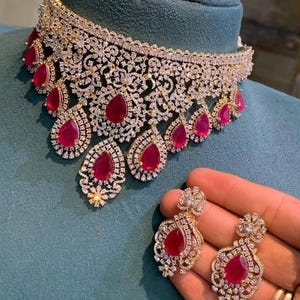 Bridal Ruby Choker Necklace Set with Matching Earrings – Heavy CZ Diamond Work Red Stone Indian Wedding Jewelry for Women & Brides.