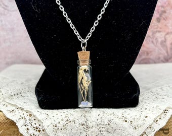 Glass bottle pendant- Tiny glass vial necklace with dried flowers and crystals