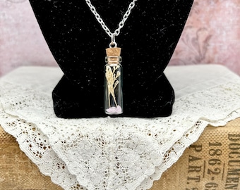 Glass bottle pendant- Tiny glass vial necklace with dried flowers and crystals
