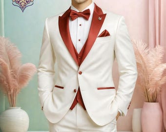 Buy Elegant Ivory Tuxedo Suit with Red Satin Lapel for Weddings, Parties & Formal Occasions.